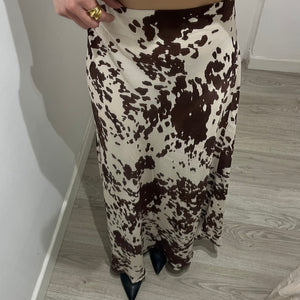FALDA SATINADA VACA LUM