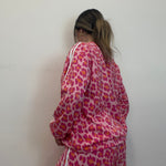 SUDADERA LINEAL ANIMAL PRINT